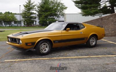 Photo of a 1973 Ford Mach 1 Cobra Jet Q Code In Gold Glow for sale