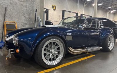 Photo of a 1965 Shelby Cobra Backdraft RT4 Black PKG Fuel Injected for sale