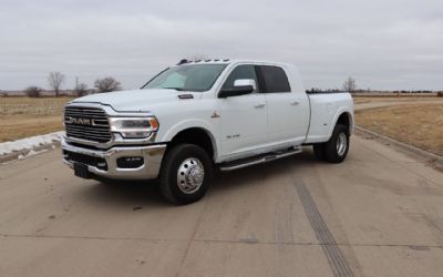 Photo of a 2022 RAM 3500 Laramie 4X4 4DR Mega Cab 6.3 FT. SB DRW Pickup for sale