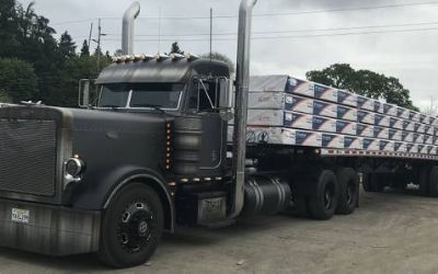 Photo of a 2000 Peterbilt 379 Day Cab & 2017 48' Flatbed Trailer for sale