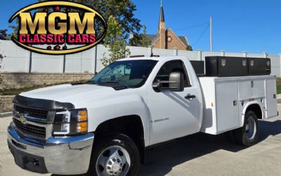 Photo of a 2009 Chevrolet Silverado 3500HD Work Truck 4X4 2DR Regular Cab LB DRW for sale