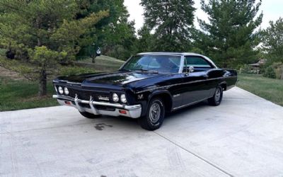 Photo of a 1966 Chevrolet Impala 168 SS 396 4SPD 12 Bolt Tach Buckets Factory Black for sale