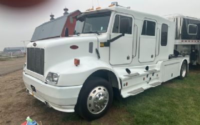 Photo of a 2000 Peterbilt 330 Business Class Custom Schwalb Stretch Hauler for sale